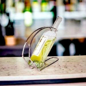 NIB Wine Display Brookstone Wine Holder Polished Silver Chrome Wine Serving Arc